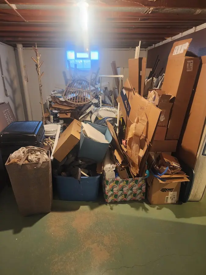 Roll-off dumpster container at job site for Yard Waste Dumpster Rental in Nichols Hills